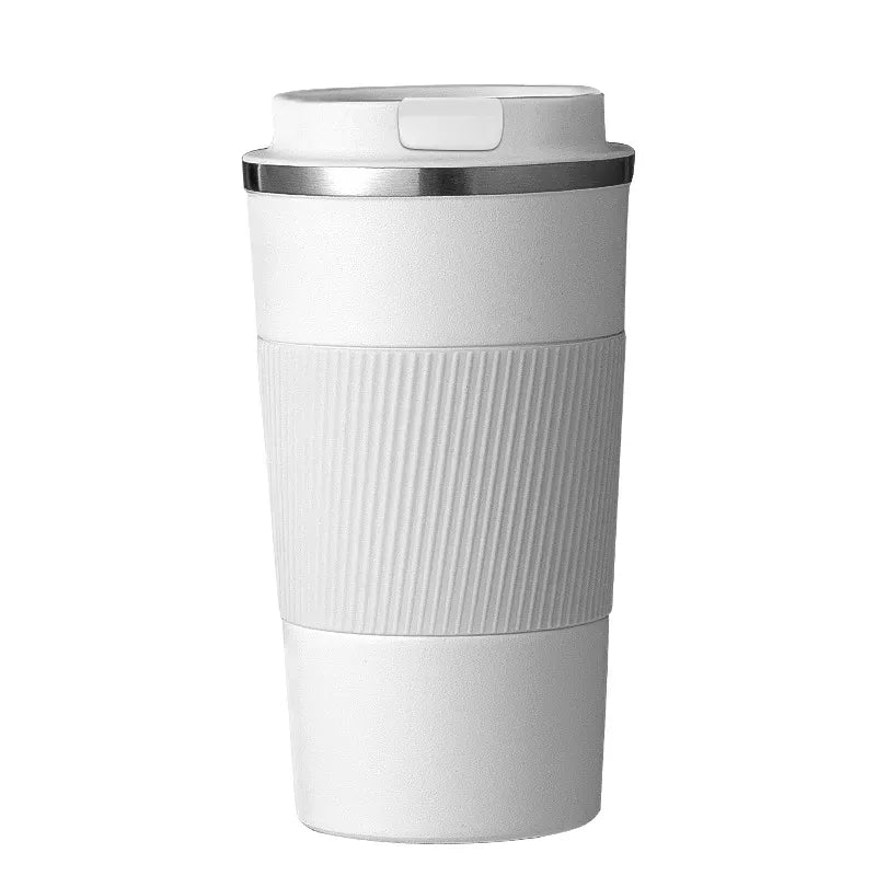 White travel mug with a ribbed texture on a white background