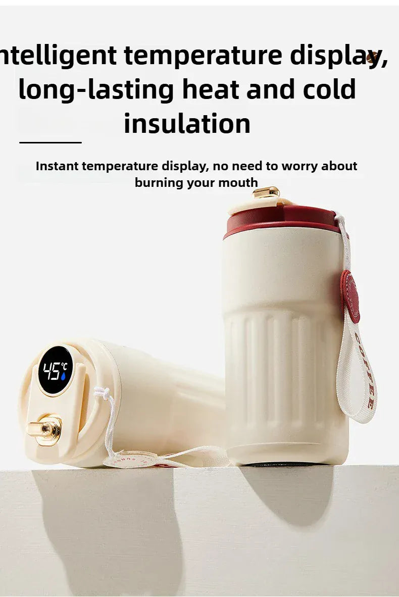 Heated water bottle with digital temperature display on a white background