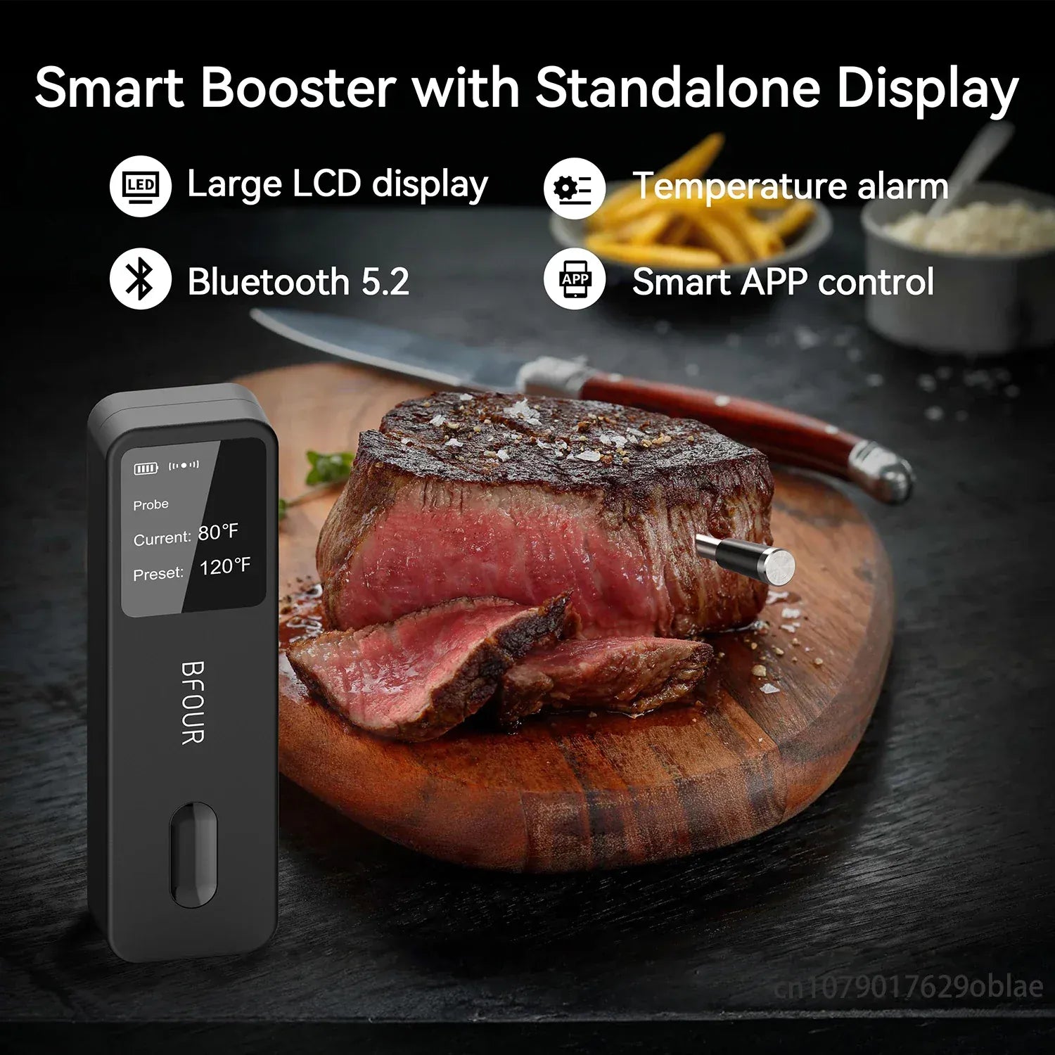 Smart meat thermometer with stand-alone display on a cutting board with steak, knife, and fork.