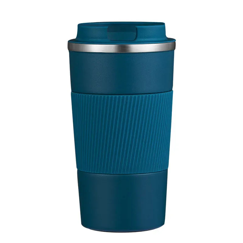Blue travel mug with a ribbed texture on a white background