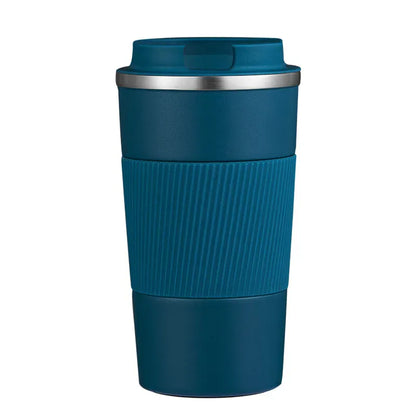 Blue travel mug with a ribbed texture on a white background
