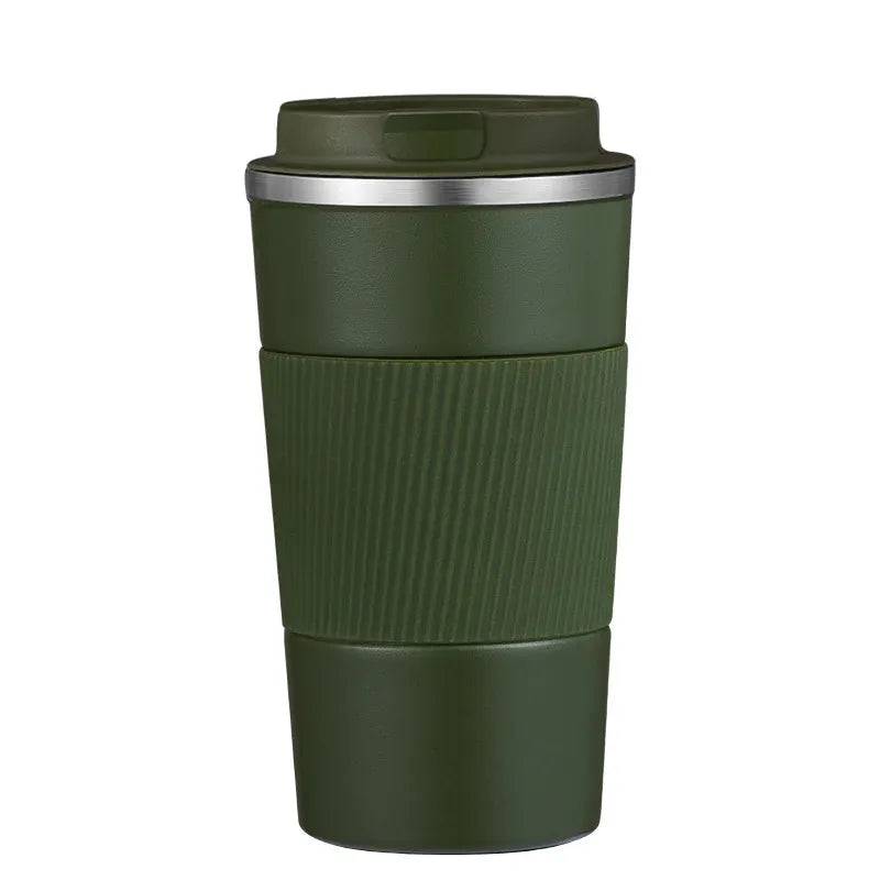 Green travel mug with a silver lid on a white background