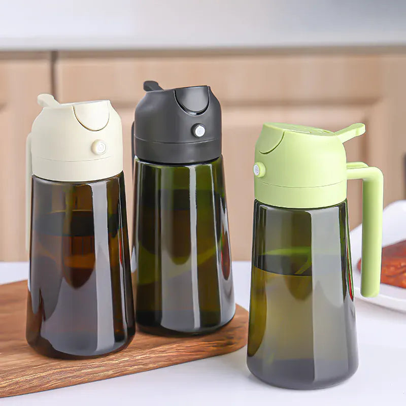 Three transparent water bottles with different colored lids on a kitchen counter.