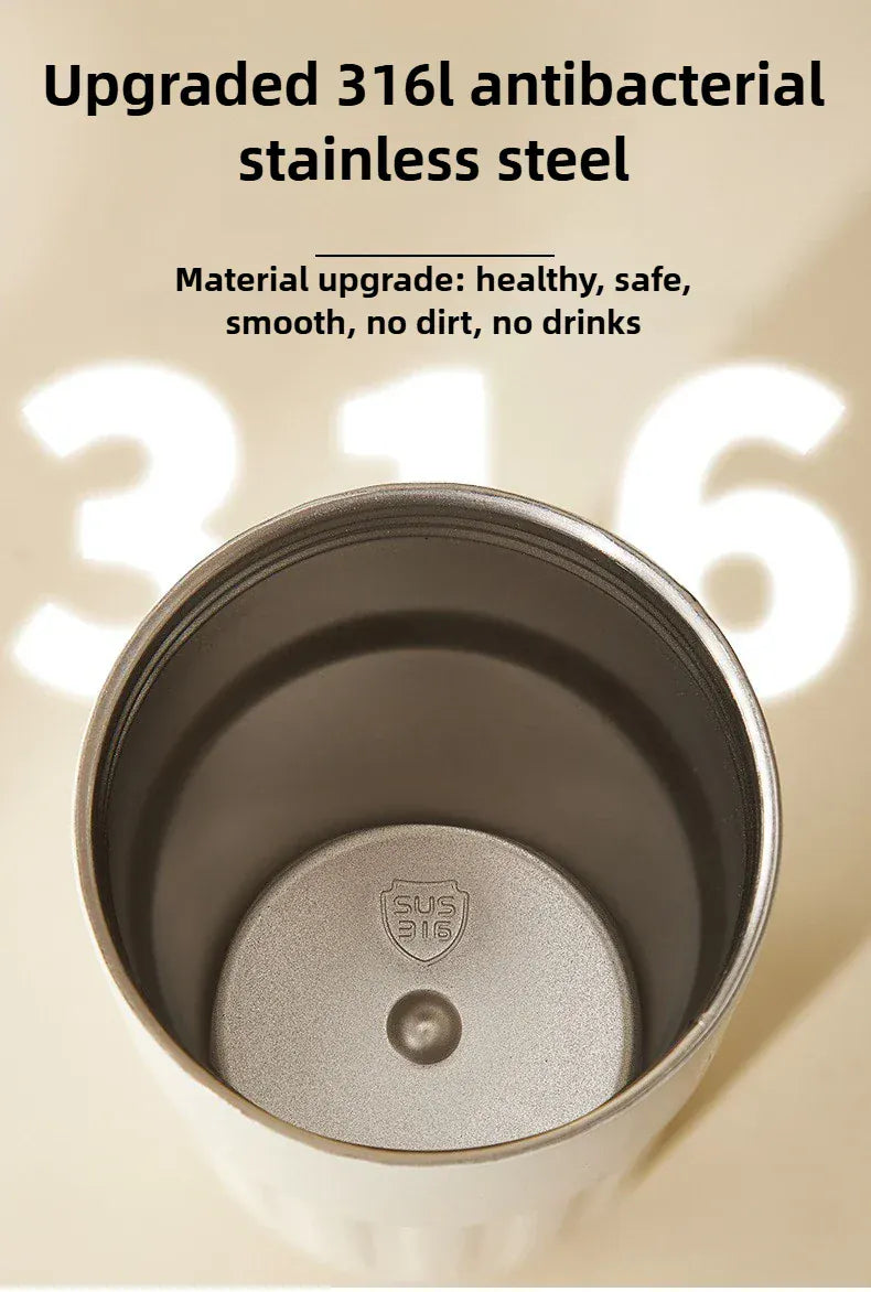 Stainless steel cup with 316L material text on a beige background