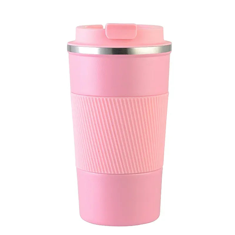 Pink travel mug with a ribbed texture on a white background