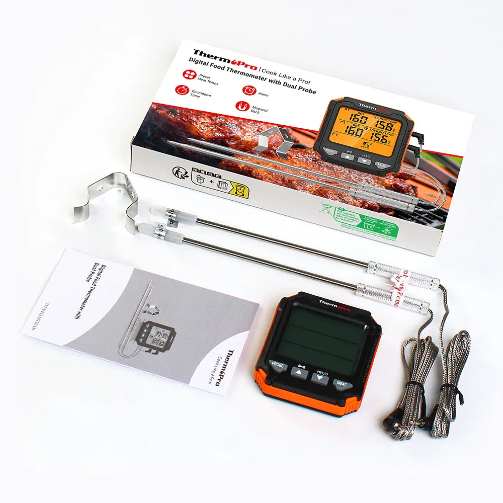 Digital food thermometer with probes and packaging on a white background