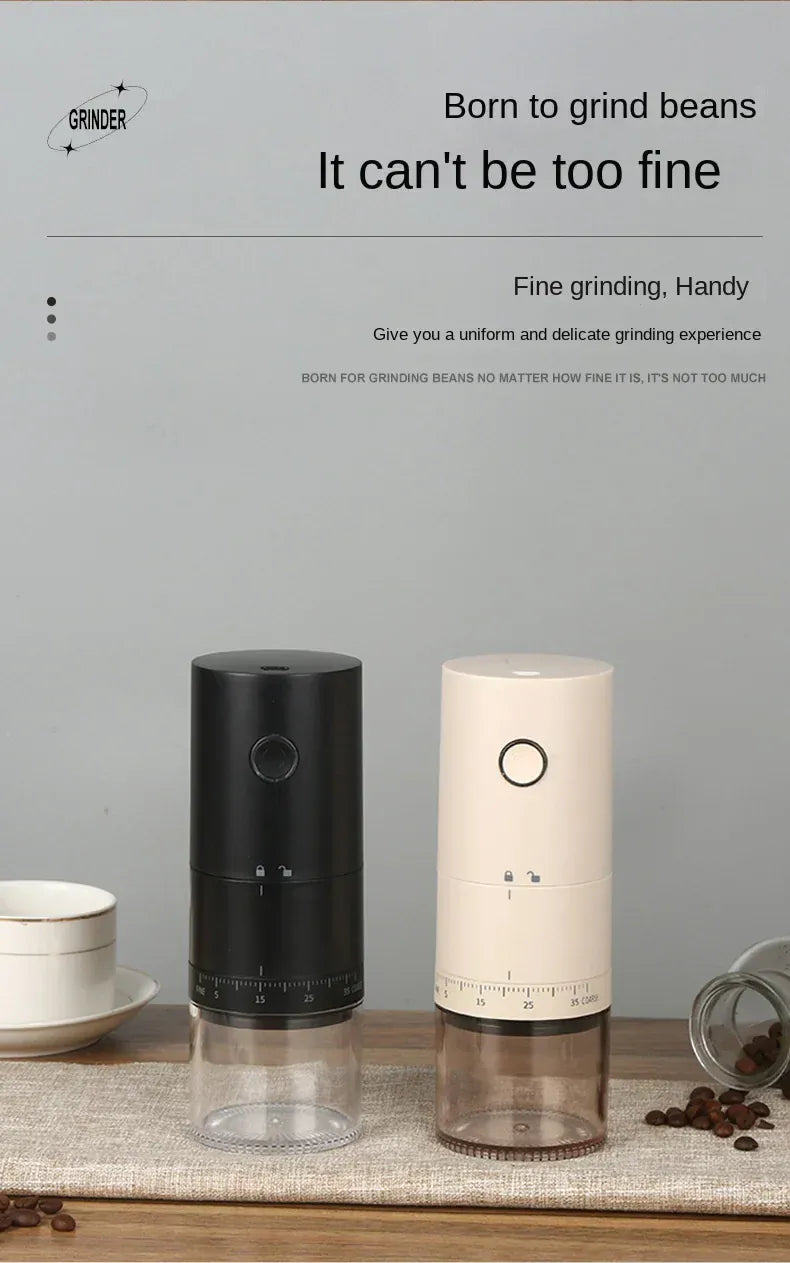 Two coffee grinders, one black and one white, on a wooden surface with a gray background.