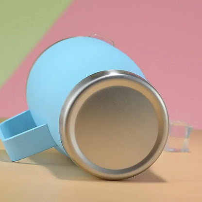 Blue mug with a metal interior on a colorful background