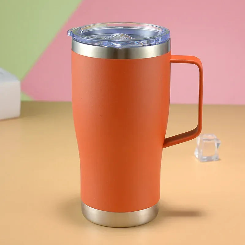 Orange insulated mug with handle on a colorful background