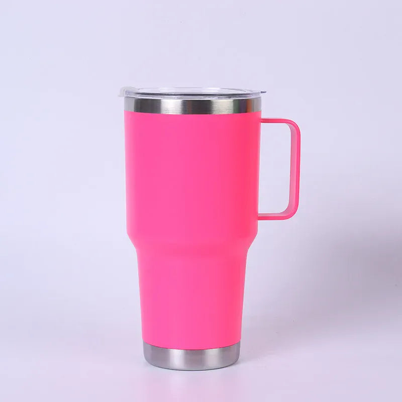 Pink insulated mug with a handle on a light purple background