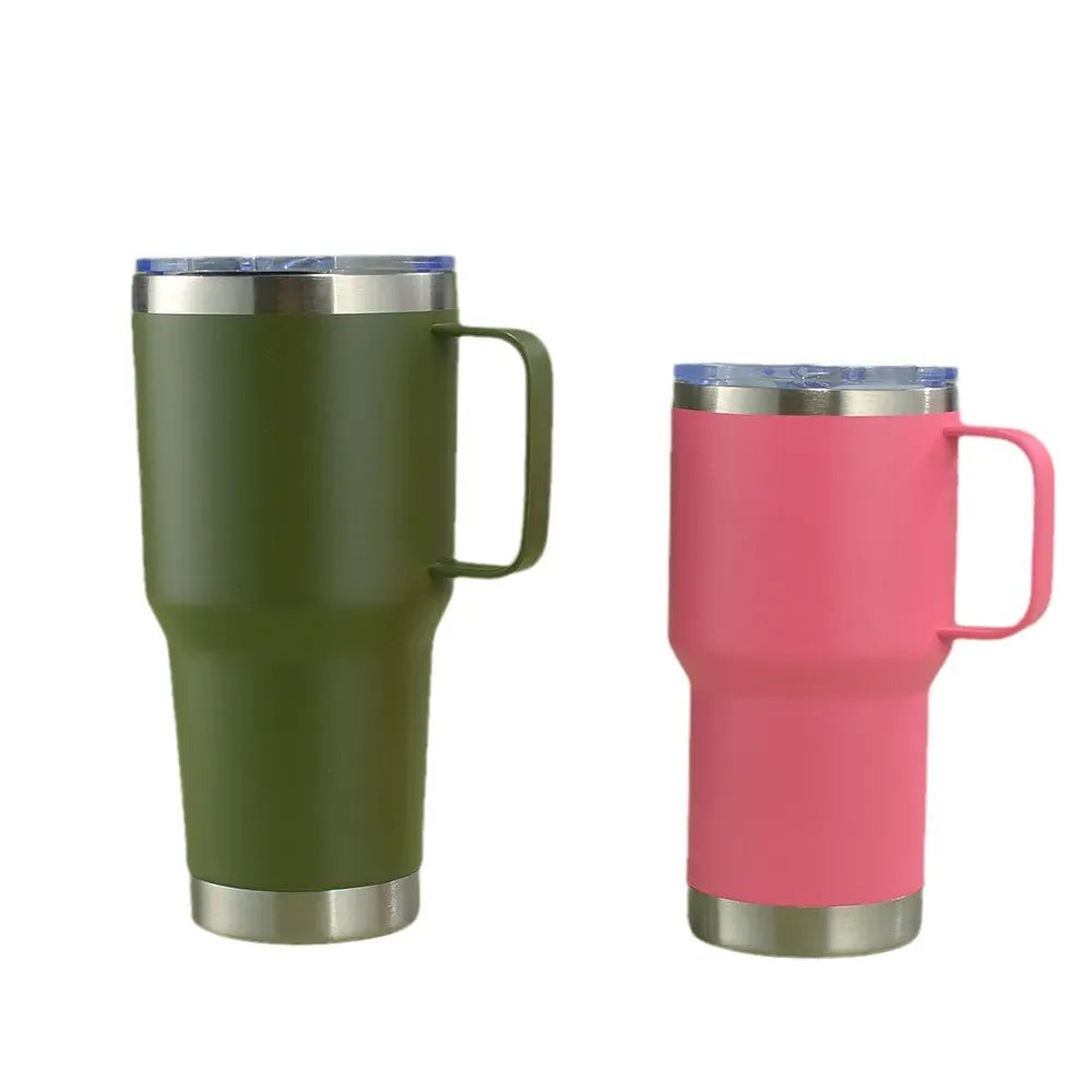 Green and pink insulated travel mugs with handles on a white background