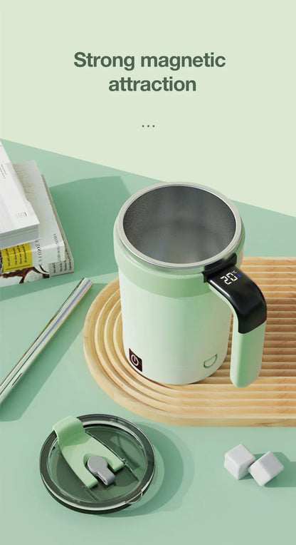 Green mug with black handle on a green surface with text 'Strong magnetic attraction'.