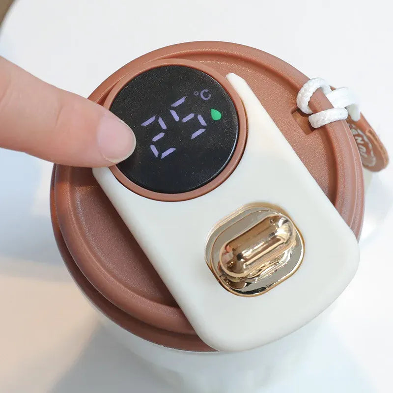 Digital thermometer with a digital display on a white background