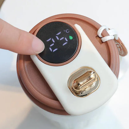 Digital thermometer with a digital display on a white background