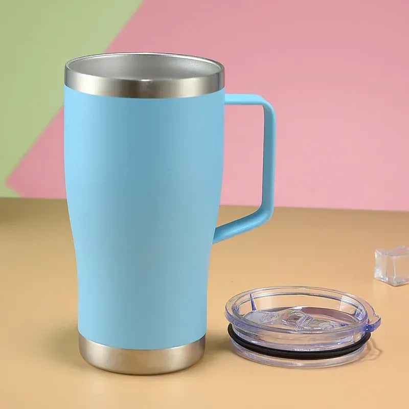 Blue insulated mug with a metal handle and lid on a colorful background