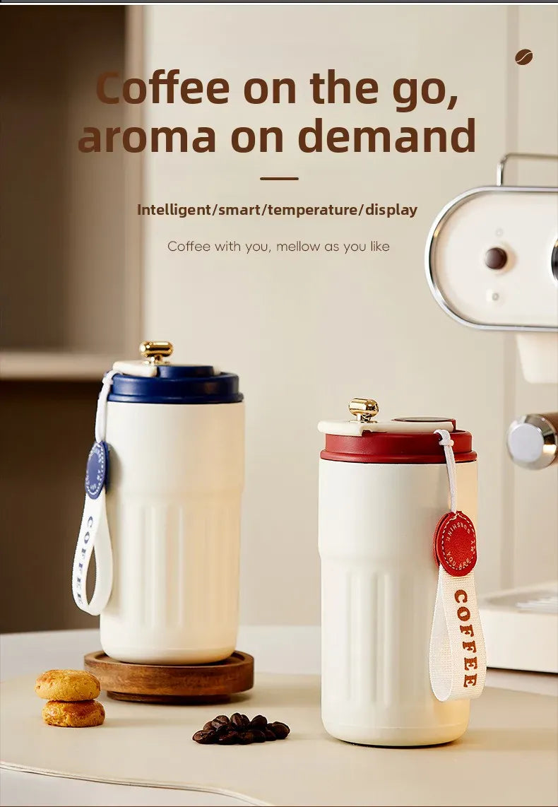 Two white coffee cups with colorful lids on a kitchen counter, with text about coffee on the go.