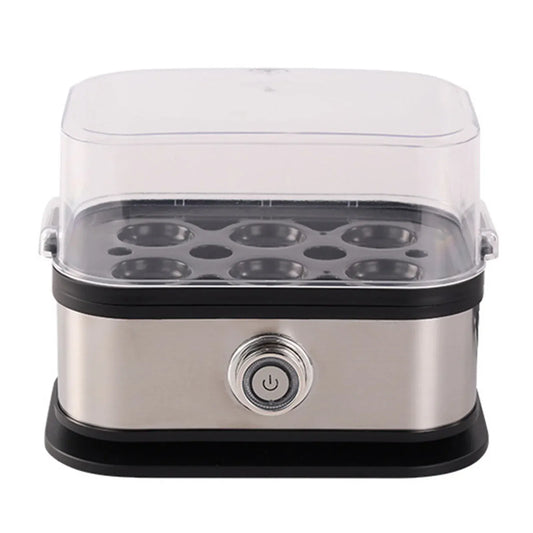 Stainless steel egg cooker with clear lid on a white background
