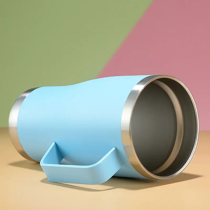 Blue and silver cup with a unique design on a colorful background