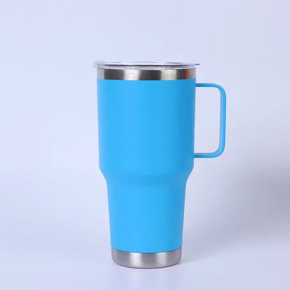 Blue insulated mug with a handle on a light purple background