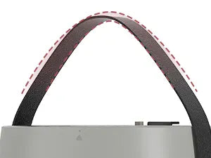 Close-up of a belt with a red dashed line on a white background