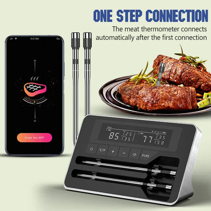 Smart meat thermometer with app connection displayed on a phone, next to cooked meat and skewers.