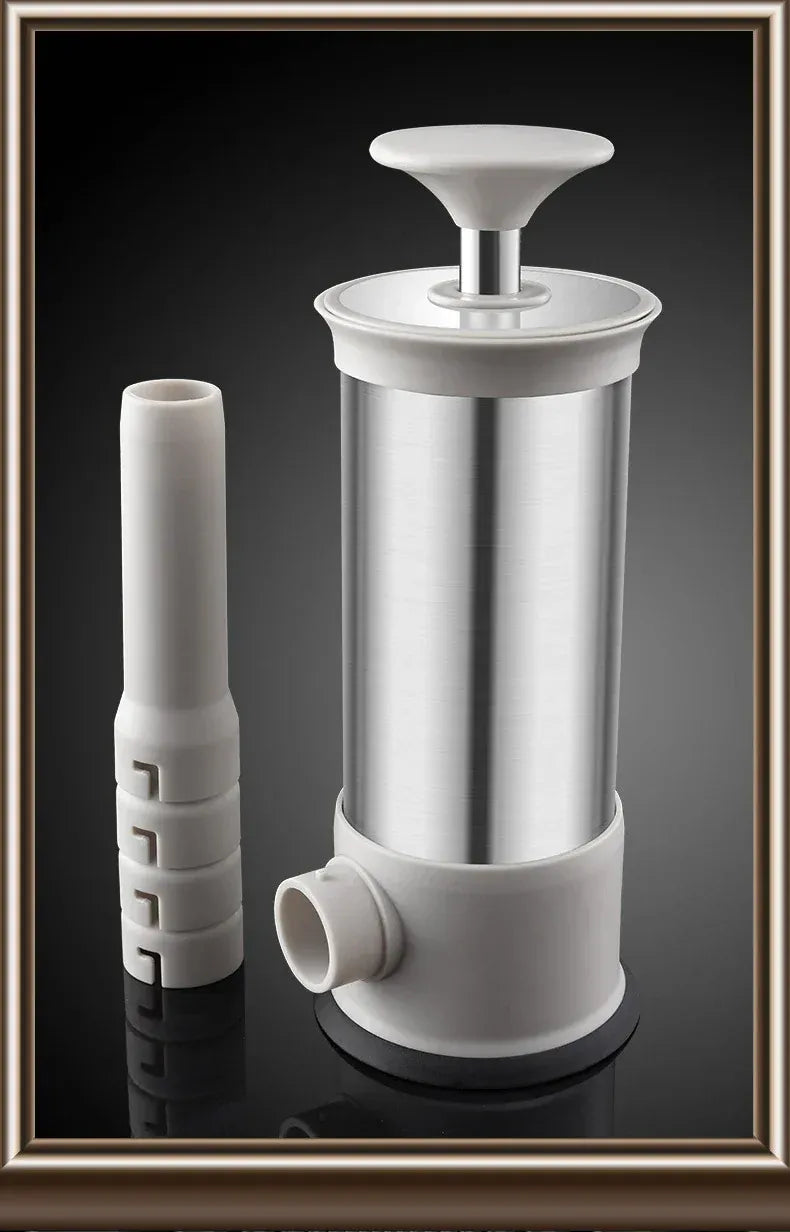 White and silver kitchen tool on a reflective black surface