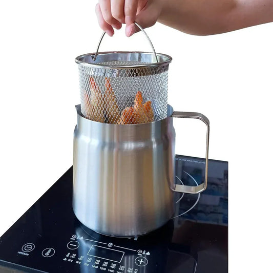 Stainless steel deep fryer basket with food being lifted out of a pot on an electric stove.